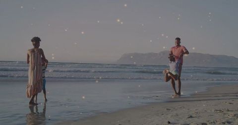 Family Enjoying Peaceful Sunset at the Beach