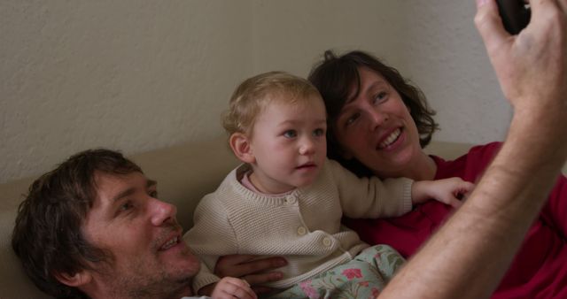 Young Family Taking Selfie Together on Couch at Home - Download Free Stock Images Pikwizard.com