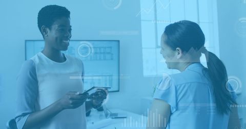 Diverse businesswomen analyzing digital data innovation
