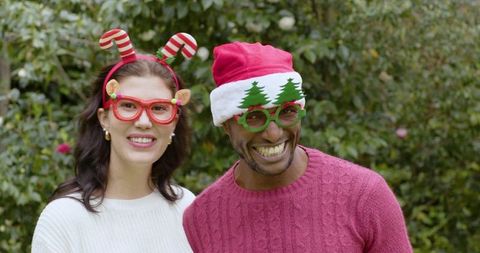 Joyful Couple in Festive Attire Celebrating Outdoors
