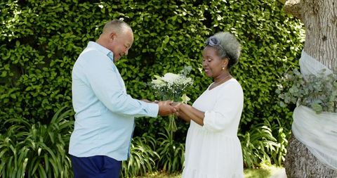 Senior Couple Wedding Ceremony in Garden Setting
