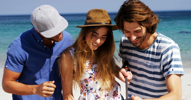 Young Friends Enjoying Beach Together Using Selfie Stick - Download Free Stock Images Pikwizard.com