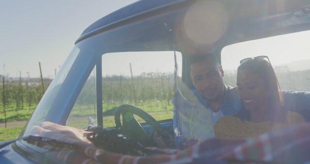 African American couple enjoys a sunny day in a vintage car, with copy space - Download Free Stock Photos Pikwizard.com