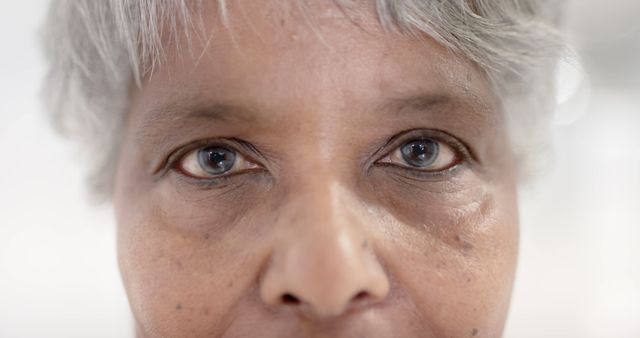 Close-Up of Elderly Woman's Eyes with Aging Skin - Download Free Stock Images Pikwizard.com