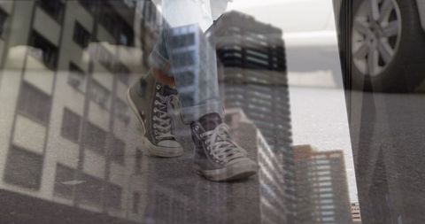 Dynamic urban sneakers blurring high-rise reflections