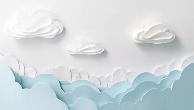 Floating layered paper clouds with soft blue foreground and white papercraft sky