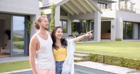 Diverse Couple Smiling by Pool on Sunny Day - Download Free Stock Images Pikwizard.com