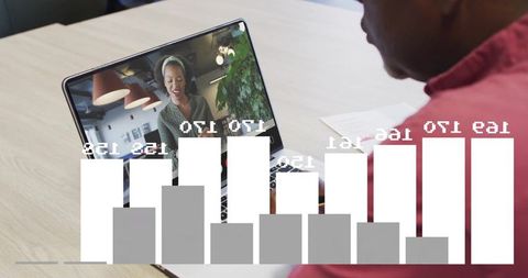 Senior Man Engaged in Virtual Team Meeting with Analytics Overlay