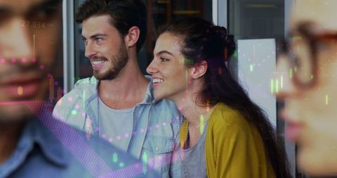 Smiling Team with Financial Data Overlay in Modern Office