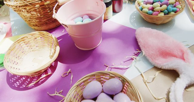 Colorful Easter Egg Decorating Scene with Baskets and Bunny Ears - Download Free Stock Images Pikwizard.com