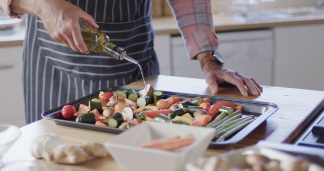 Person Preparing Roasted Vegetables in Kitchen - Download Free Stock Images Pikwizard.com