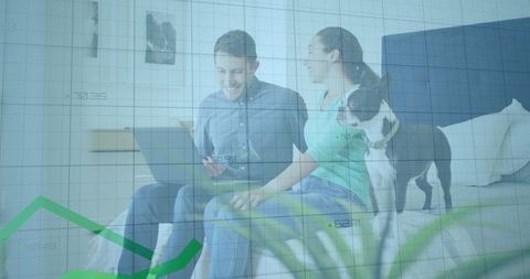 Couple Analyzing Financial Data with Pet Dog on Bed