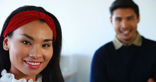 Smiling Woman and Man in Casual Office Setting - Download Free Stock Images Pikwizard.com