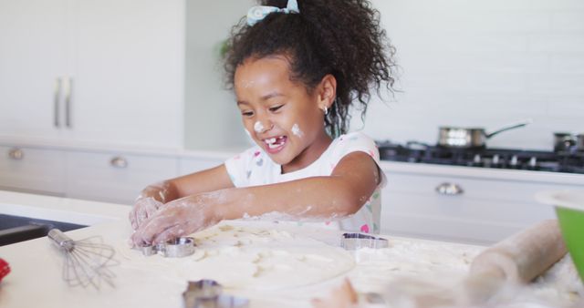 Joyful Little Girl Baking Cookies in Bright Kitchen - Download Free Stock Images Pikwizard.com