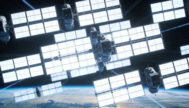 Orbiting Satellite Constellation with Solar Arrays and Modular Trusses above Planetary Limb