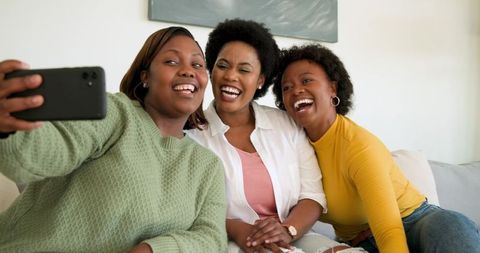 Joyful Friends Taking Selfie for Unforgettable Moments