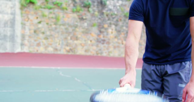 Man Playing Tennis Swinging Racket on Outdoor Court - Download Free Stock Images Pikwizard.com