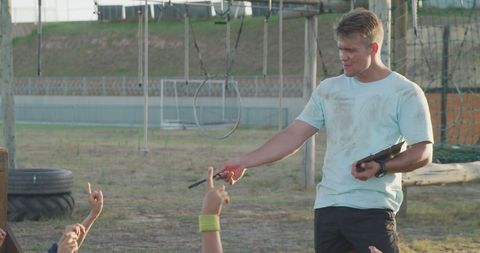 Coach Instructing Kids at Outdoor Boot Camp - Download Free Stock Images Pikwizard.com