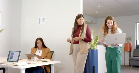 Modern Office Collaboration Among Diverse Professionals