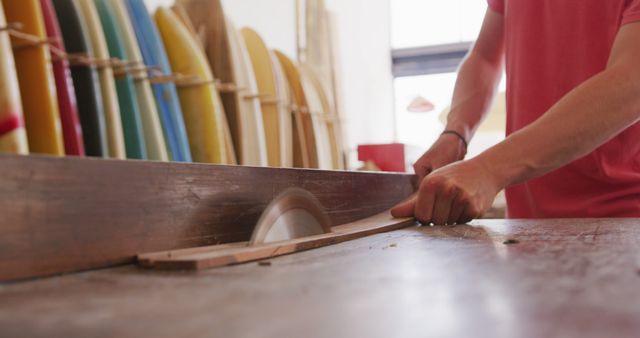 Skilled Craftsman Cutting Wood in Workshop - Download Free Stock Images Pikwizard.com