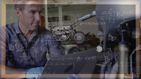 Mechanic in Workshop Analyzing Complex Mathematical Equations