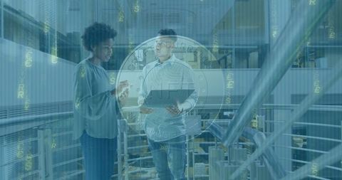 Colleagues engaging in discussion on office walkway with technology