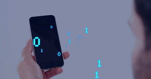 Holding smartphone displaying floating binary code and blue glow for digital security