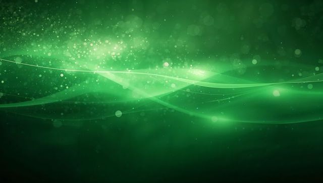Flowing Luminous Green Wave with Bokeh Particles Creating Abstract Neon Desktop Background