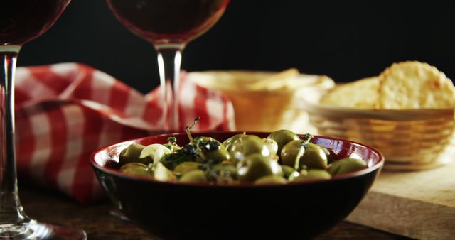 Appetizing Green Olives in Bowl with Red Wine and Crackers - Download Free Stock Images Pikwizard.com