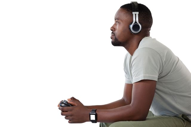 Focused Man Playing Video Game with Headphones - Download Free Stock Photos Pikwizard.com