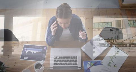 Businesswoman Multitasking in Modern Office Setting with Cityscape - Download Free Stock Images Pikwizard.com