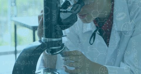 Female scientist conducting research with microscope