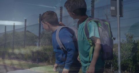 Timelapse of boys crossing intersection with urban motion