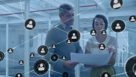 Diverse Professionals Analyzing Network Connections in Modern Office