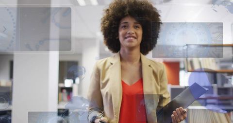 Confident professional woman standing in office holding folder with hud overlays