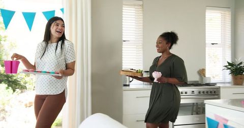 Multiracial Friends Preparing for Baby Shower Celebration