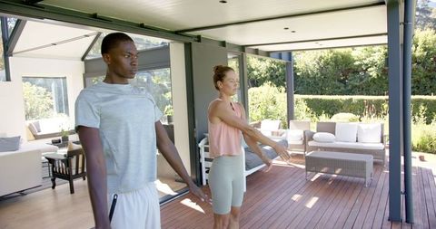 Diverse Couple Practicing Yoga on Modern Home Deck - Download Free Stock Images Pikwizard.com