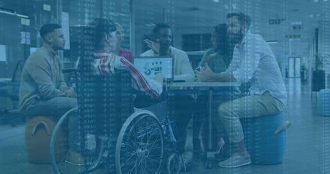 Diverse team collaborating in inclusive workplace focused on innovation