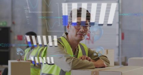 Warehouse supervisor monitoring AR analytics while overseeing palletized cardboard shipments