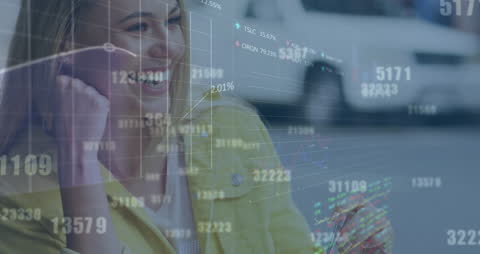 Businesswoman Analyzing Financial Data Using Smartphone Technology