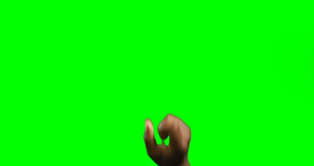 Hand making gesture against green screen background, useful for graphics designers, video creators, or presentations. Ideal for visual effects and overlay projects requiring clean keying for inserting other graphics or videos.
