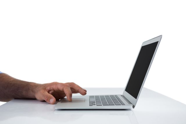 Male executive using laptop at desk - Download Free Stock Photos Pikwizard.com