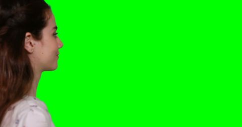 Woman Interacting with Motion Display Using Green Screen - Download Free Stock Images Pikwizard.com