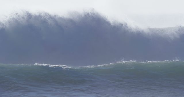 A massive wave crests with power, showcasing the raw force of the ocean - Download Free Stock Photos Pikwizard.com