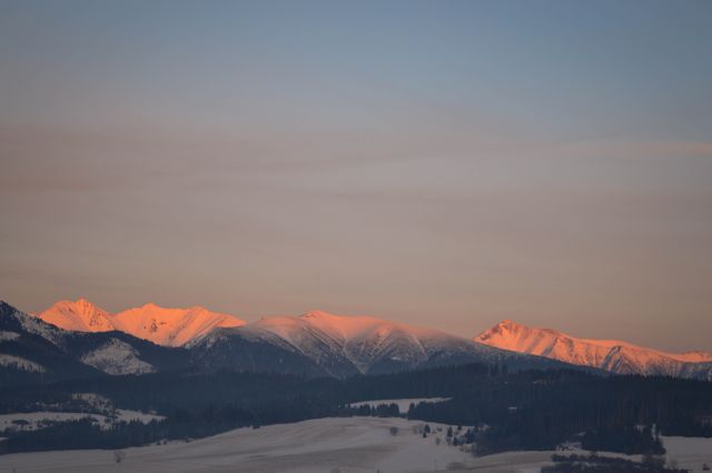 Mountain Range at Sunset with Pink Glow - Download Free Stock Photos Pikwizard.com