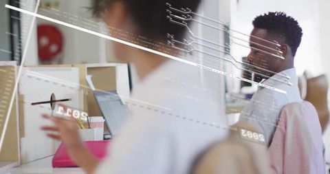 Professional team collaborating at modern office workspace