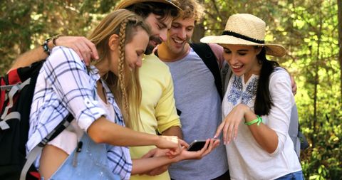 Young Adults Sharing Happy Moment with Smartphone Outdoors - Download Free Stock Images Pikwizard.com