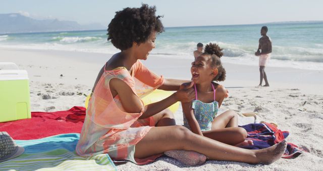 Mother Bonding with Daughter at Sunny Beach - Download Free Stock Images Pikwizard.com