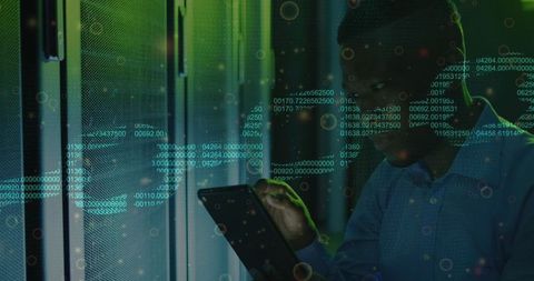 IT Professional Analyzing Data in Advanced Server Room - Download Free Stock Images Pikwizard.com