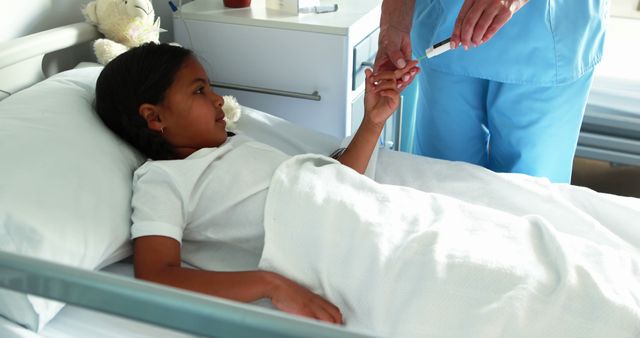 Nurse Checking Blood Sugar Levels of Young Girl in Hospital Bed - Download Free Stock Images Pikwizard.com